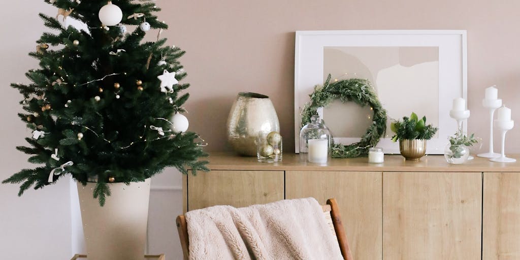 A vibrant, cozy living room setting showcasing Wayfair's diverse furniture collection. The room should be styled with a mix of modern and traditional pieces, highlighting the versatility of Wayfair's offerings. Natural light filters through large windows, creating an inviting atmosphere. Include a family enjoying the space, emphasizing the emotional connection to home.