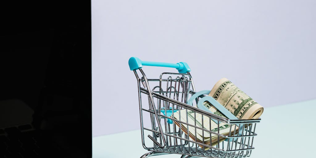 A close-up shot of a shopping cart filled with tech products from Newegg, set against a blurred background of a busy online shopping interface. This image should evoke the excitement of online shopping, with a focus on the ease and convenience of purchasing tech items through Newegg.