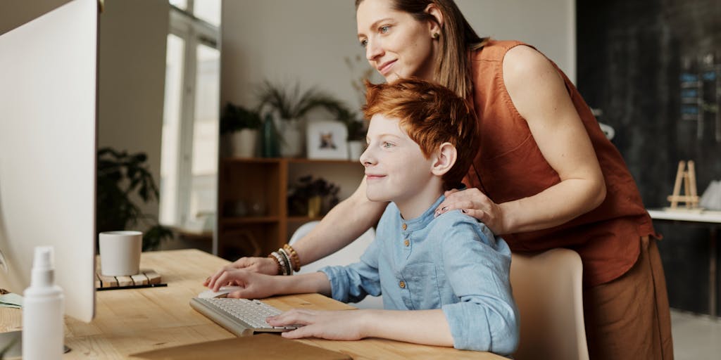 A heartwarming image of a family watching a Dallas Cowboys game together at home, with the TV displaying a thrilling moment from a game. The room is decorated with Cowboys memorabilia, and the family is engaged and cheering. This photo emphasizes the emotional connection and traditions that the Cowboys foster among their fans, aligning with their marketing strategy focused on family and community.