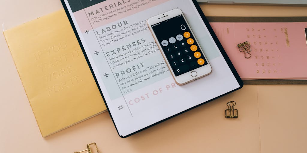 A close-up shot of a hand holding a smartphone displaying the Rocketreach pricing page, with a blurred background of a bustling office environment. This captures the idea of accessibility and the modern approach to business solutions.