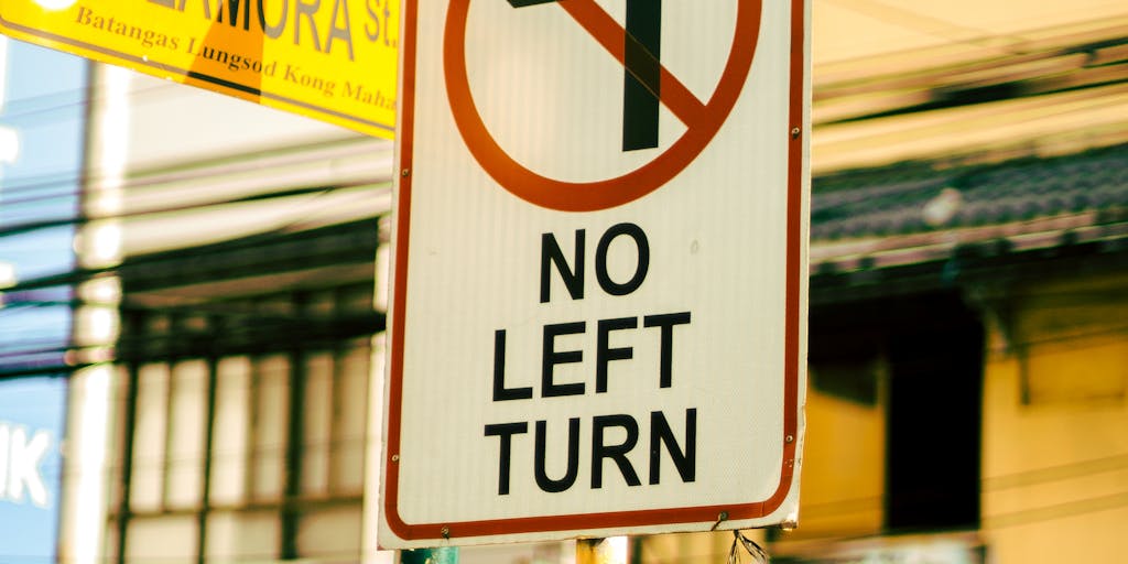 A conceptual image of a person standing at a crossroads with two signs pointing in different directions labeled 'Basic Plan' and 'Premium Plan'. The background should depict a vibrant cityscape to symbolize growth and opportunity.