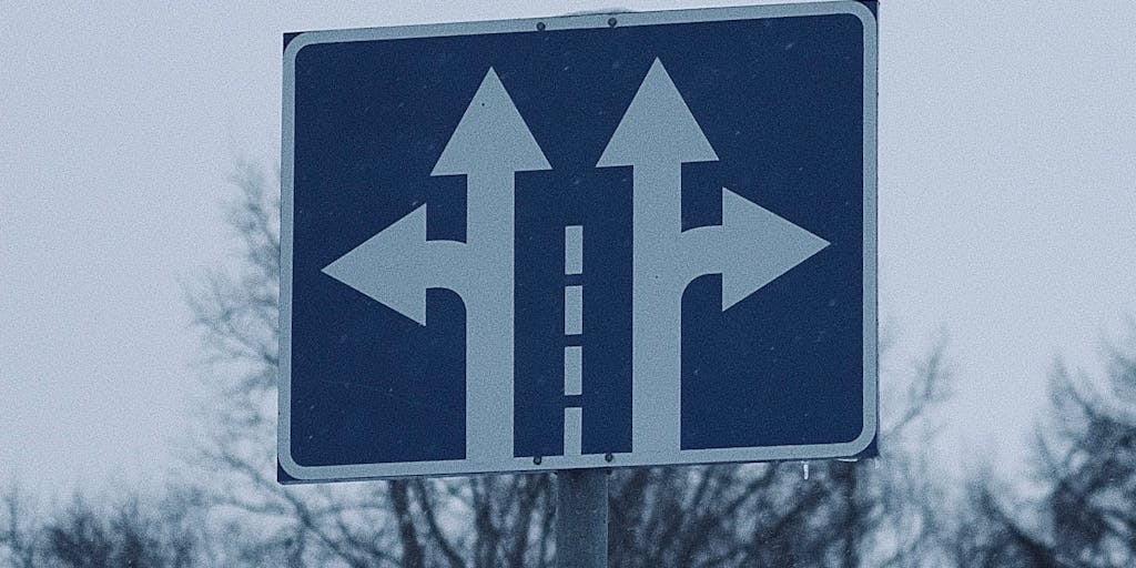 A conceptual image of a person standing at a crossroads, with one path leading to a signpost labeled 'Affordable Pricing' and the other to 'Premium Features'. The person is contemplating which direction to take, symbolizing the decision-making process regarding Snov.io pricing.