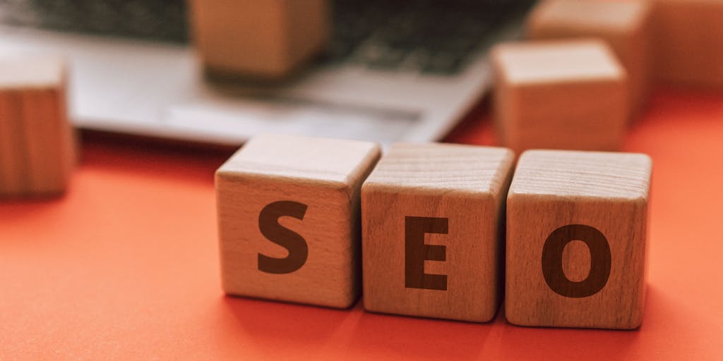 A before-and-after style image where the 'before' side shows a dull, low-traffic website and the 'after' side showcases a vibrant, high-traffic website with analytics graphs and positive metrics, highlighting the transformation with Outrank.so.