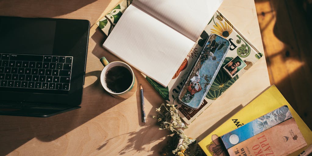 A person sitting in a cozy nook, surrounded by books and plants, with a laptop open to a free AI writing tool. The warm lighting and inviting atmosphere convey a sense of comfort and inspiration while using technology for writing.