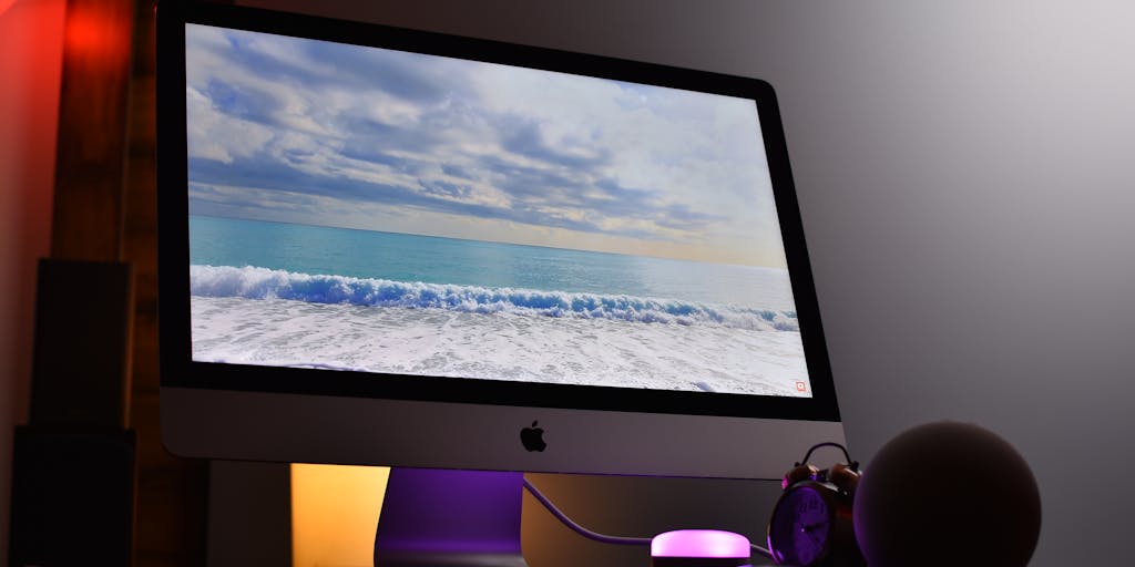 An artistic representation of a neuron with its dendrites extending towards a glowing computer screen displaying SEO analytics. In the background, a surfer is catching a wave, with the ocean reflecting the data points and graphs from the screen, merging the concepts of creativity and data-driven strategies.