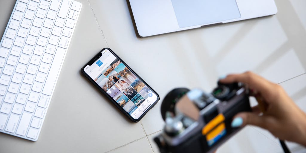 A dynamic action shot of two content creators in a friendly competition, one using Publer and the other using FeedHive. They are both engaged in creating posts, with a scoreboard in the background showing likes and shares, emphasizing the effectiveness of each platform in real-time.