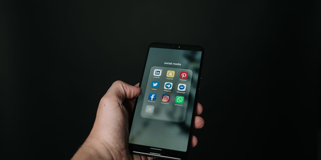 An infographic-style image that visually compares the features of Publer and SocialPilot. Use icons and graphics to represent key features like scheduling, analytics, and user interface. The background can be a light gradient to keep it visually appealing and easy to read.