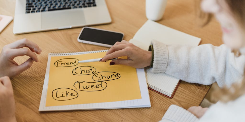 A dynamic action shot of two marketers in a friendly competition, one using SocialPilot and the other using ContentStudio. They are both engaged in a brainstorming session, with sticky notes and charts around them. The image captures the energy and creativity involved in choosing the right social media tool.