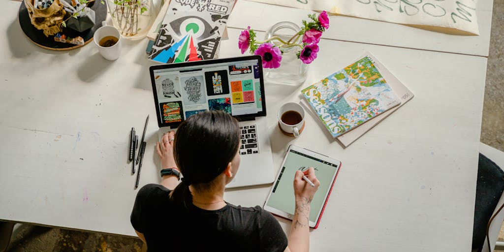 A split-screen image showing two desks, one side featuring a sleek, modern workspace with a laptop displaying Metricool's interface, and the other side showcasing a vibrant, creative setup with SocialBee's dashboard on a tablet. The contrasting styles represent the different approaches of each platform.