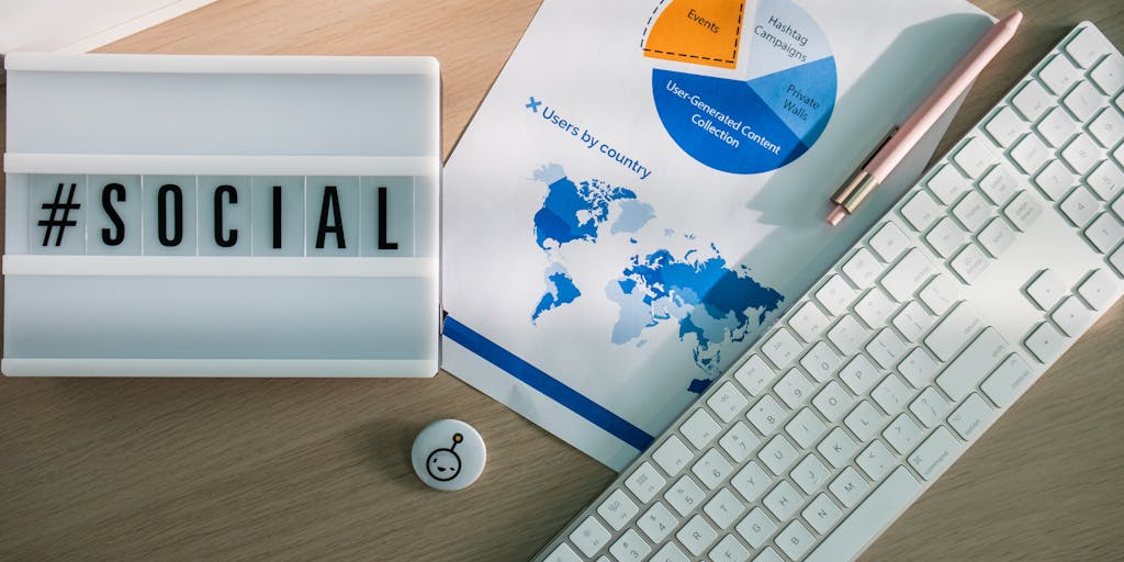 An artistic representation of a social media dashboard, with Vista Social's logo on one half and Agorapulse's logo on the other. The background features colorful graphs and analytics, symbolizing the competitive nature of social media management. The image should evoke a sense of innovation and technology.